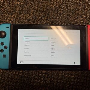 Blue and Red Handheld Gaming Console